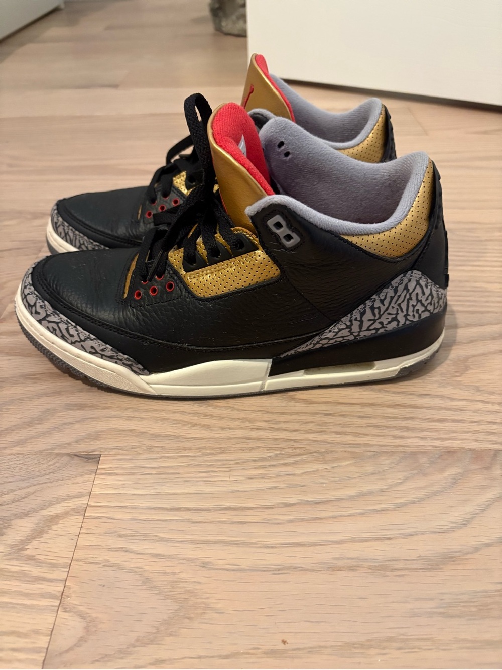 The Jordan 3 Retro Black Cement Gold Size 11.5 Women Release